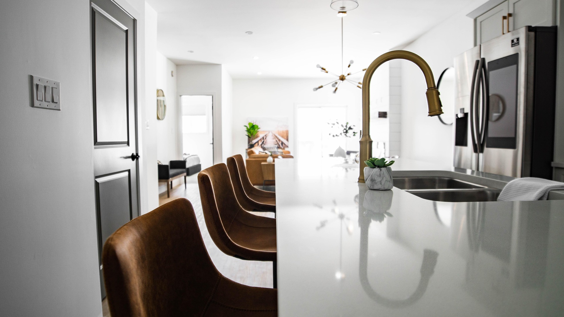 Modern kitchen with gold tap